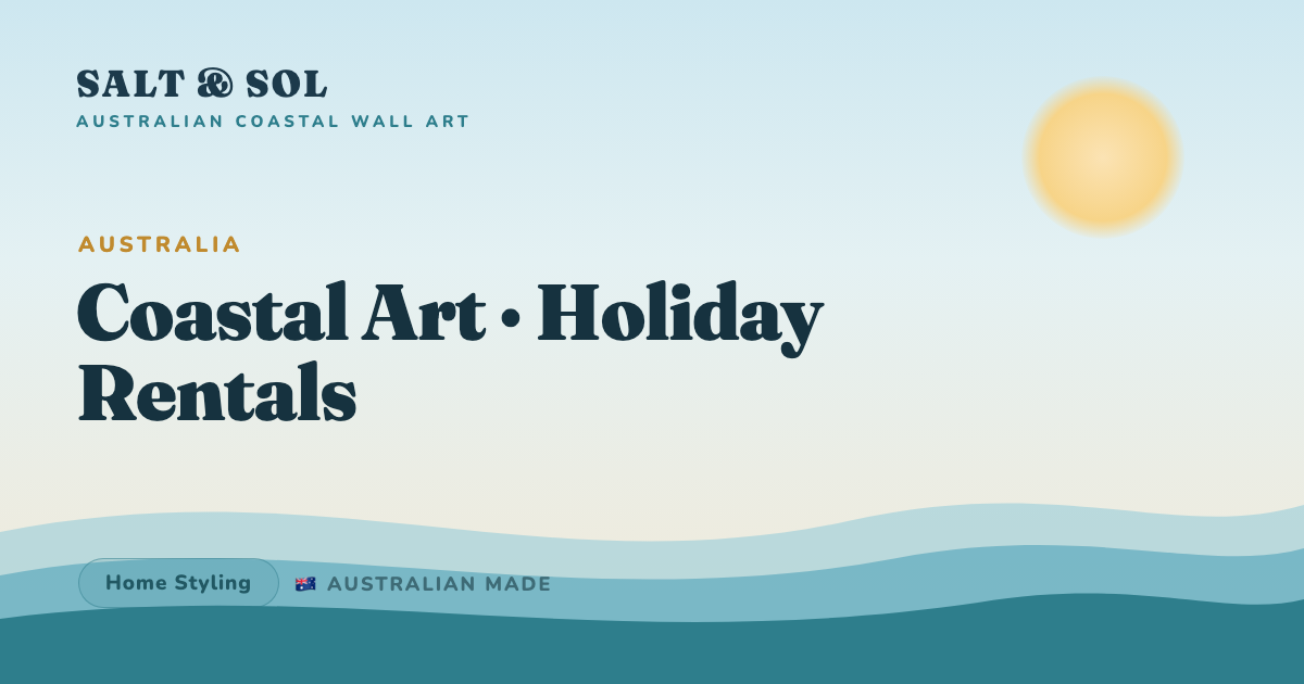 Large coastal wall art styled above a sofa in an Australian beach-house holiday rental living room