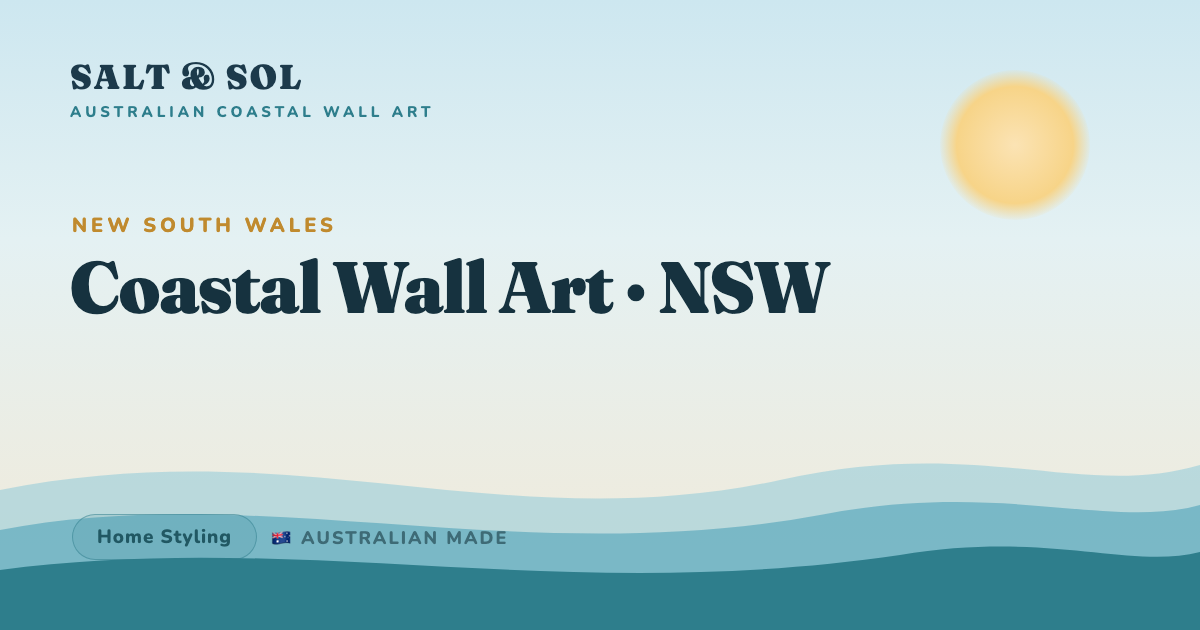 Blue coastal photography wall art styled above a sofa in a relaxed New South Wales beach home
