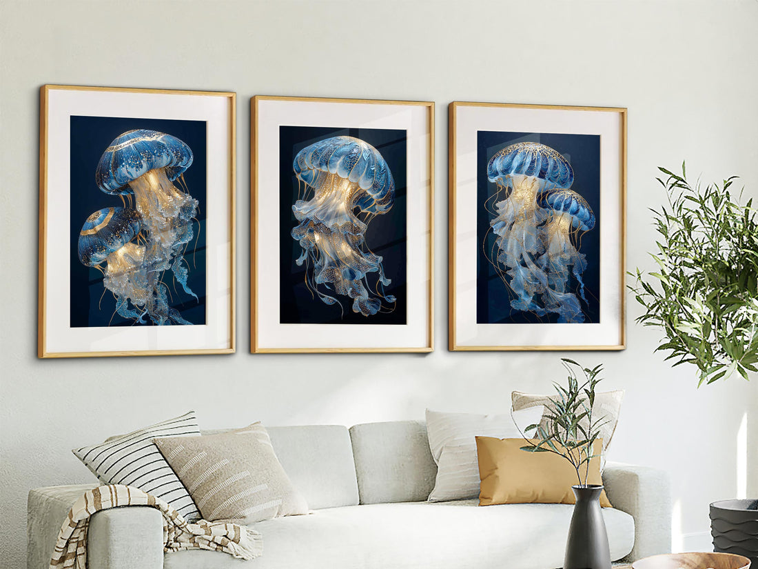 Coastal triptych anchoring a living room wall in an Australian home